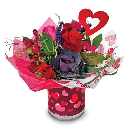 Small in size, big on beauty, roses, fillers, and fresh greens for a perfect accent.